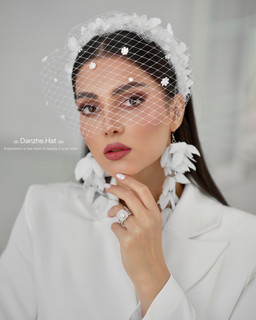 تل عروس مدل شکوفه دیزاین شده با گلهای دستساز باتور روی صورت